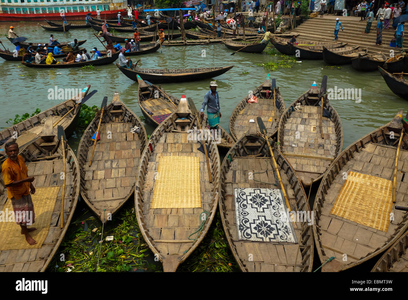 docked wooden boats in a port in dhaka, bangladesh Stock Photo