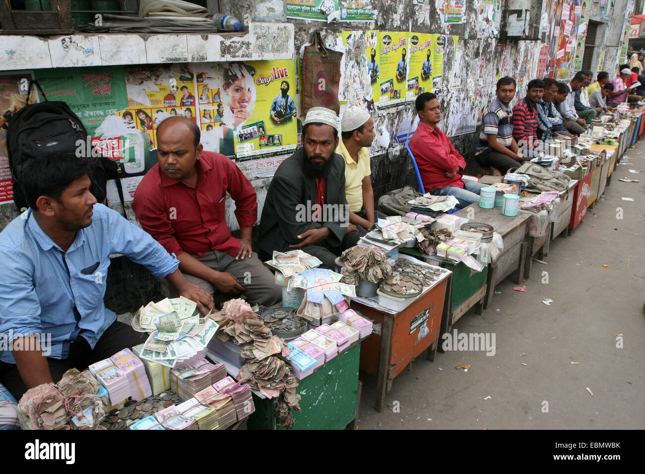 December 2014.Note dealers are buying old, dirty and unusable bills at Gulistan area in dhaka. Customers can buy/exchange their old bills from them in return of new notes. Stock Photo