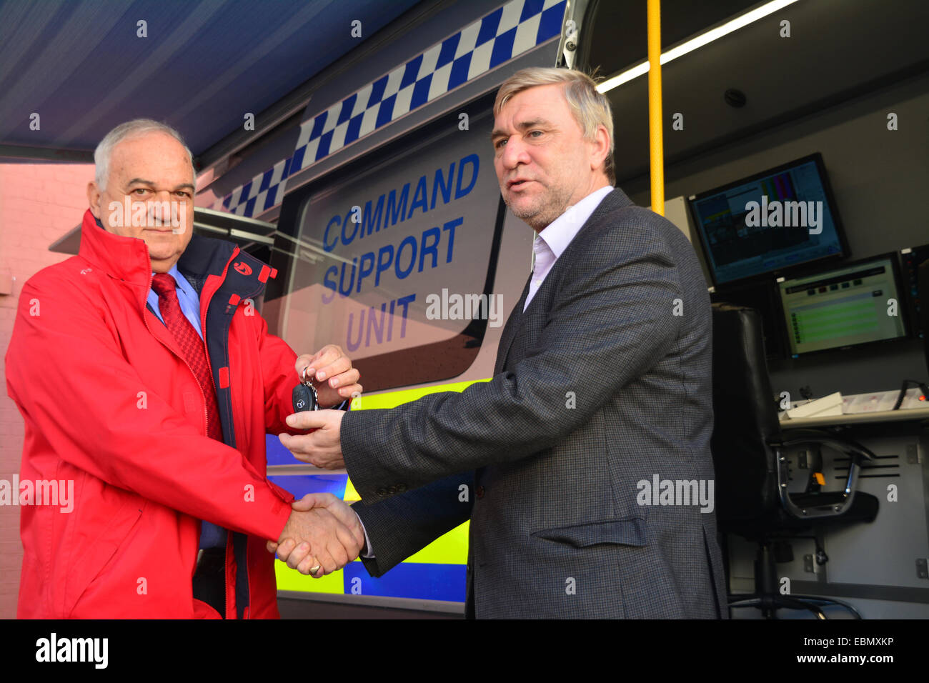 Gibraltar. 3rd December, 2014. Gibraltar Government Minister Steven Linares today officially handed over to the Director of  the Emergency Contingency Plan unit, Leslie Edmonds the keys of the newly acquired inter-agency Command Support Unit vehicle at a the Royal Gibraltar Police Rosia Compound in Gibraltar. The vehicle, which will act as a key control centre in major incidents is the latest acquisitions as a new contingency emergency plan is introduced by the Government. Credit:  Stephen Ignacio/Alamy Live News Stock Photo