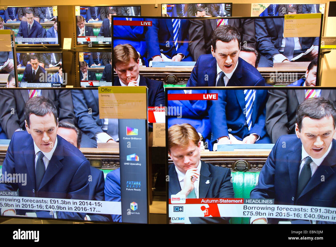 London, UK. 3rd December, 2014. Picture shows George Osborne, Chancellor of the Exchequer deleivering his Autumn Statement to the House of Commons shown on multiple televisions in a central London department store. Credit:  Clickpics/Alamy Live News Stock Photo