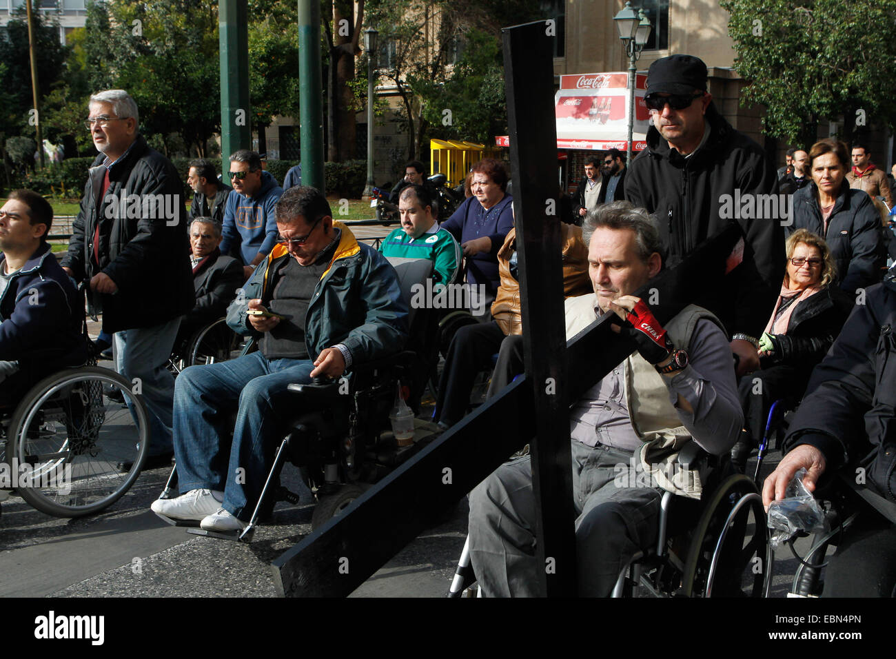 Dec. 3, 2014 Athens, GREECE Disabled people in wheelchairs hold a