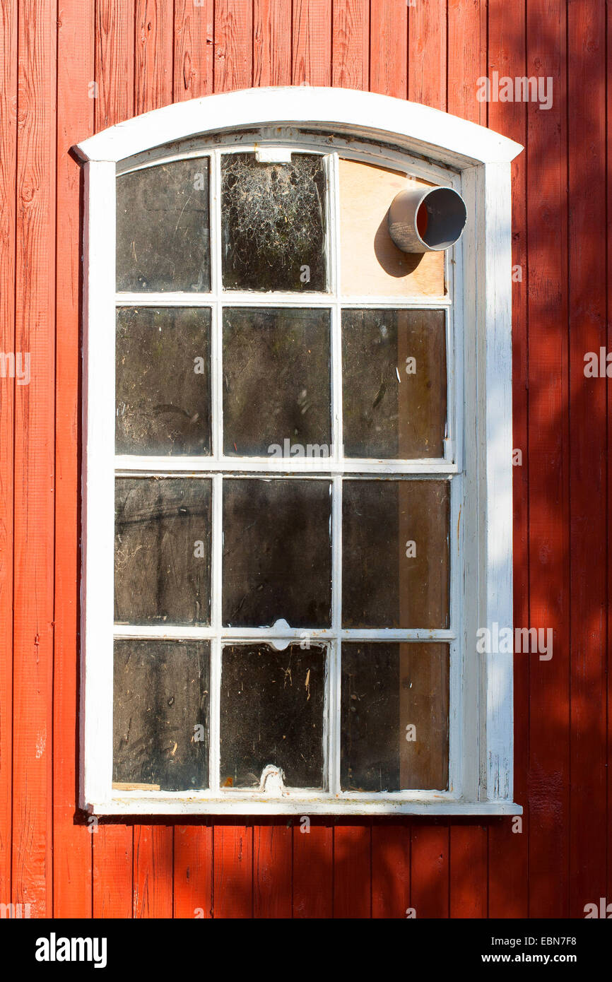 in a window built-in tube, pipe as an opening to the inside of a shed, hollow cavities as a hiding place, access for animals, Germany Stock Photo