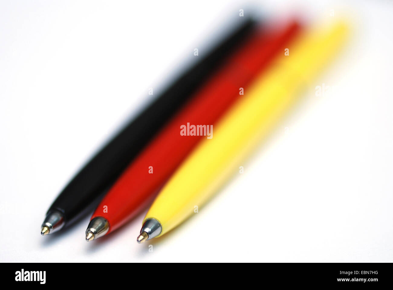 three ballpens in german national colours, german bureaucracy Stock Photo