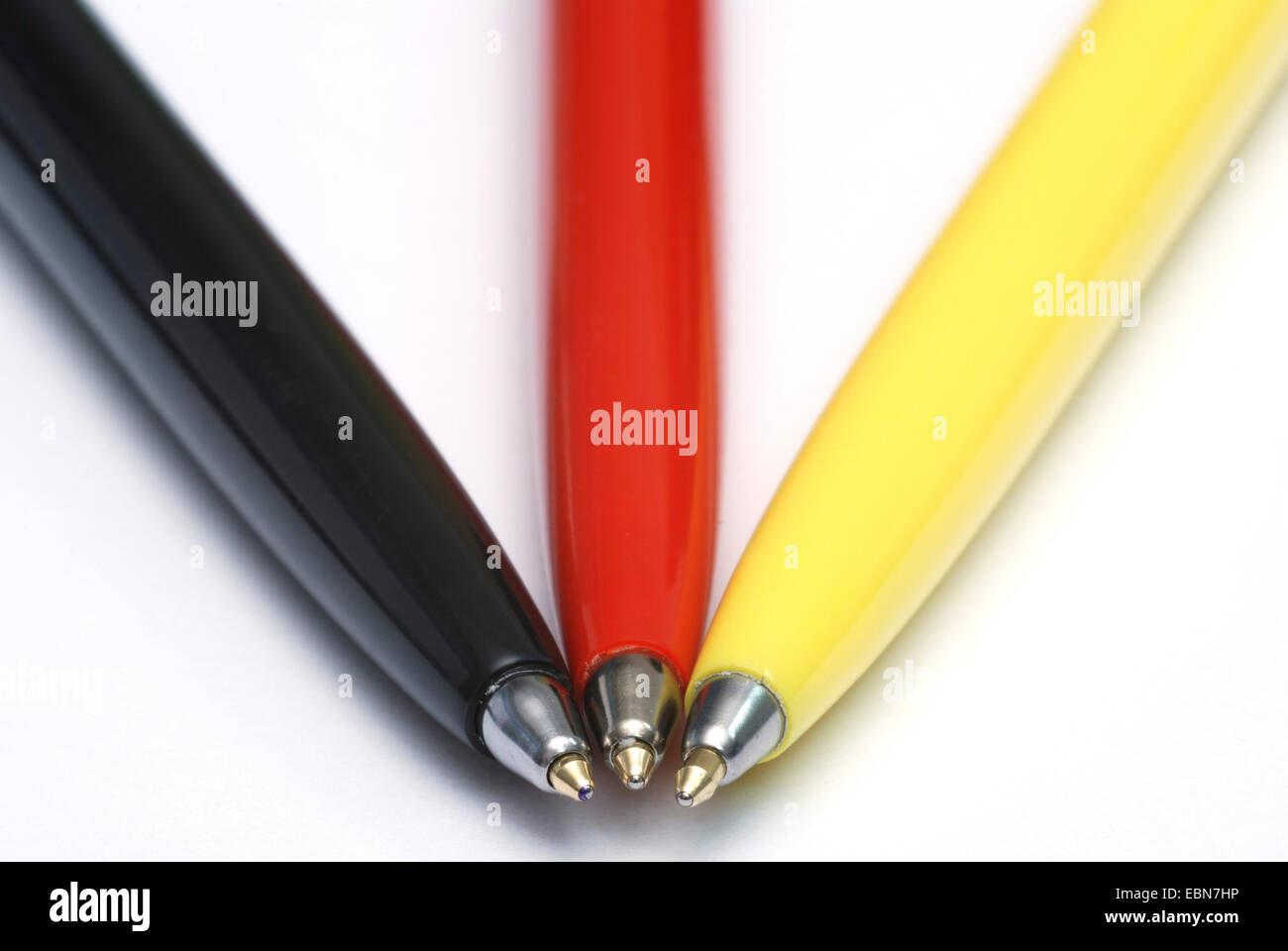 three ballpens in german national colours, german bureaucracy Stock Photo