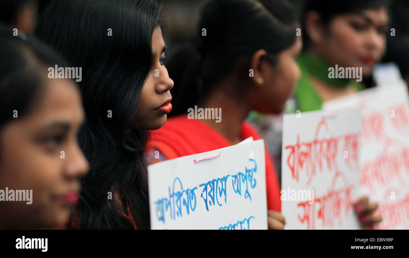 Dec. 3, 2014 - Dhaka, Bangladesh - Different women organization gathered and made human chain in front of National Press Club Dhaka protesting against child marriage in Bangladesh..Bangladesh has one of the highest rates of child marriage in the world. This survey shows that in Bangladesh, 64% of women currently aged 20â€“24 were married before the age of 18. This is despite the fact that the minimum legal age of marriage for females in Bangladesh is 18 years and 21 for males. (Credit Image: © Zakir Hossain Chowdhury/ZUMA Wire) Stock Photo