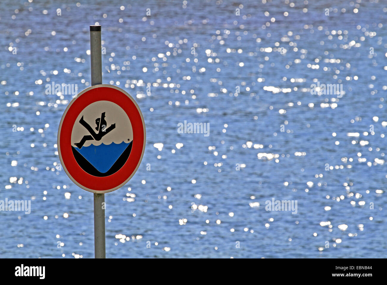 warning sign at canalized river, Germany Stock Photo