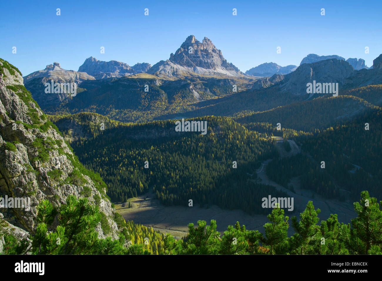 autumn landscape of the Dolomite Alps in morning light, in the center the Tre Cime di Lavaredo group, view from Piz Popena, Italy, South Tyrol, Dolomiten Stock Photo