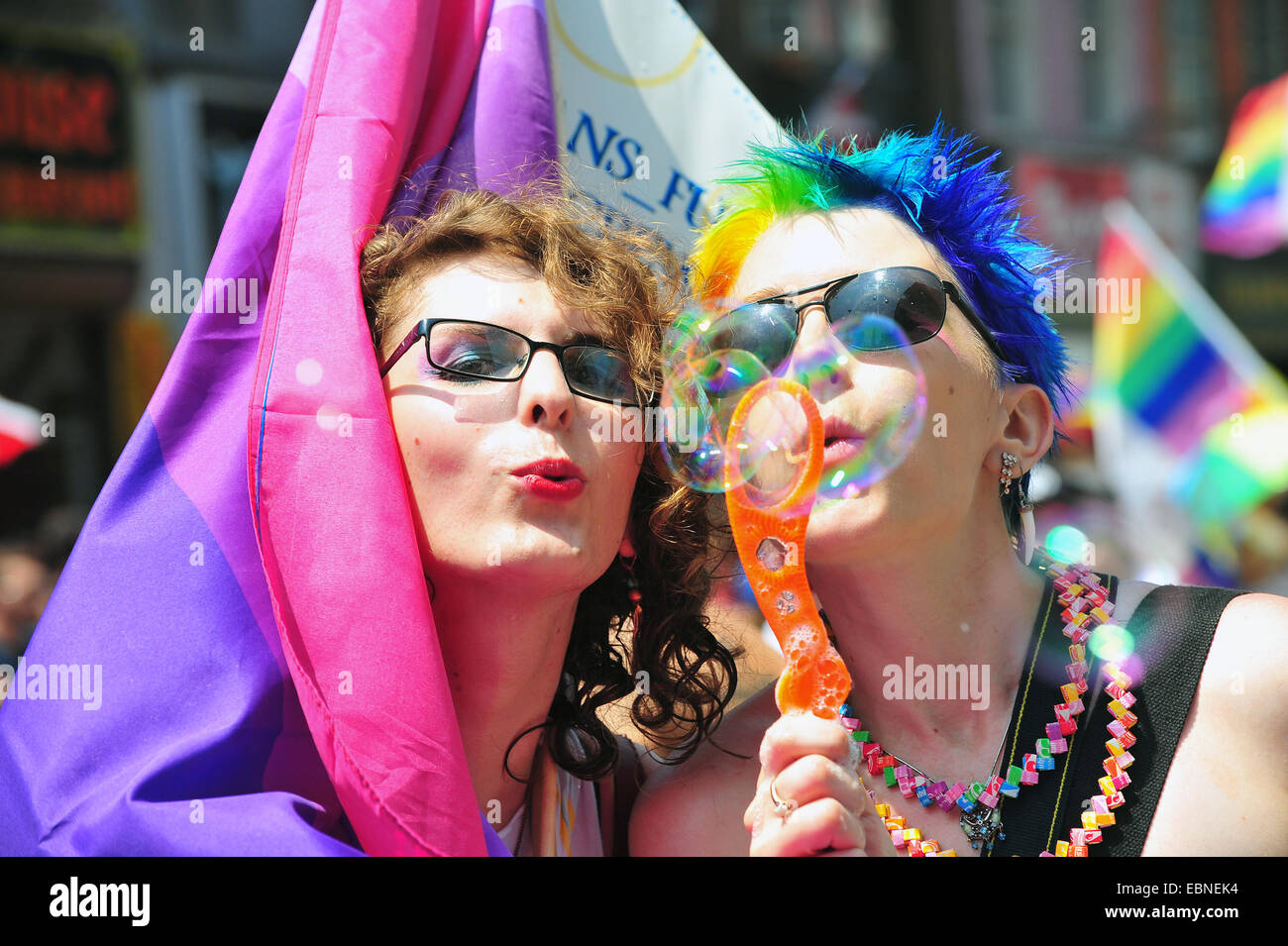 women blow bubbles at the 2014 World Pride in Toronto. Stock Photo
