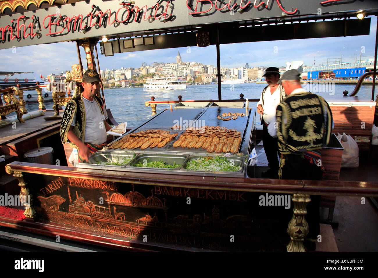 ship with fast food and fish in harbour, Turkey, Istanbul Stock Photo