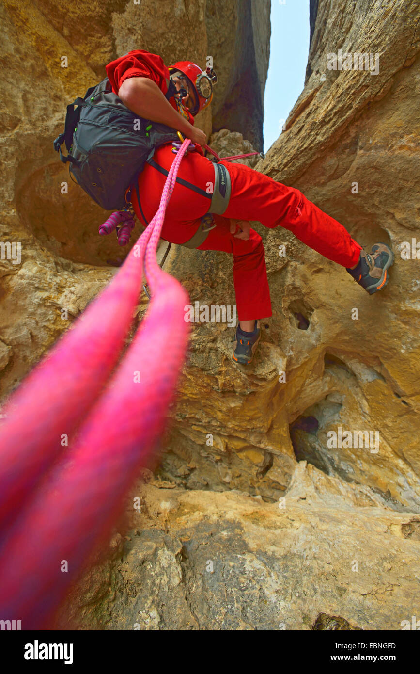 climber rappeling, France, Provence, Calanques National Park Stock Photo