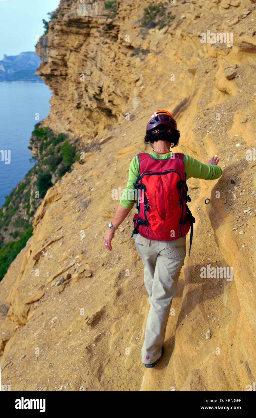 Woman hiker climbing steep slope hi-res stock photography and images ...