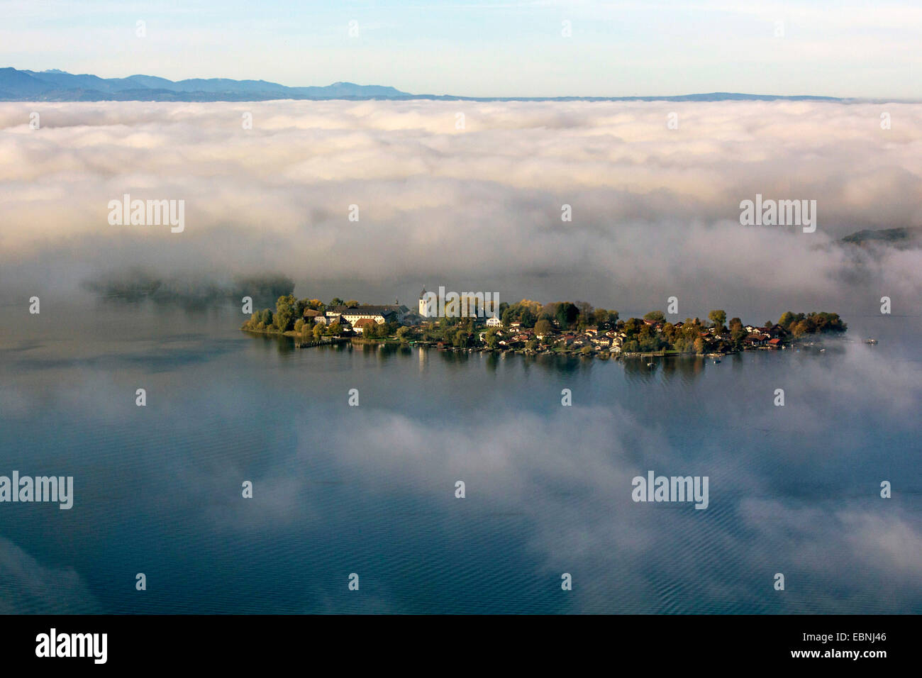 aerial view to Fraueninsel in front of high fog, Germany, Bavaria, Lake Chiemsee Stock Photo
