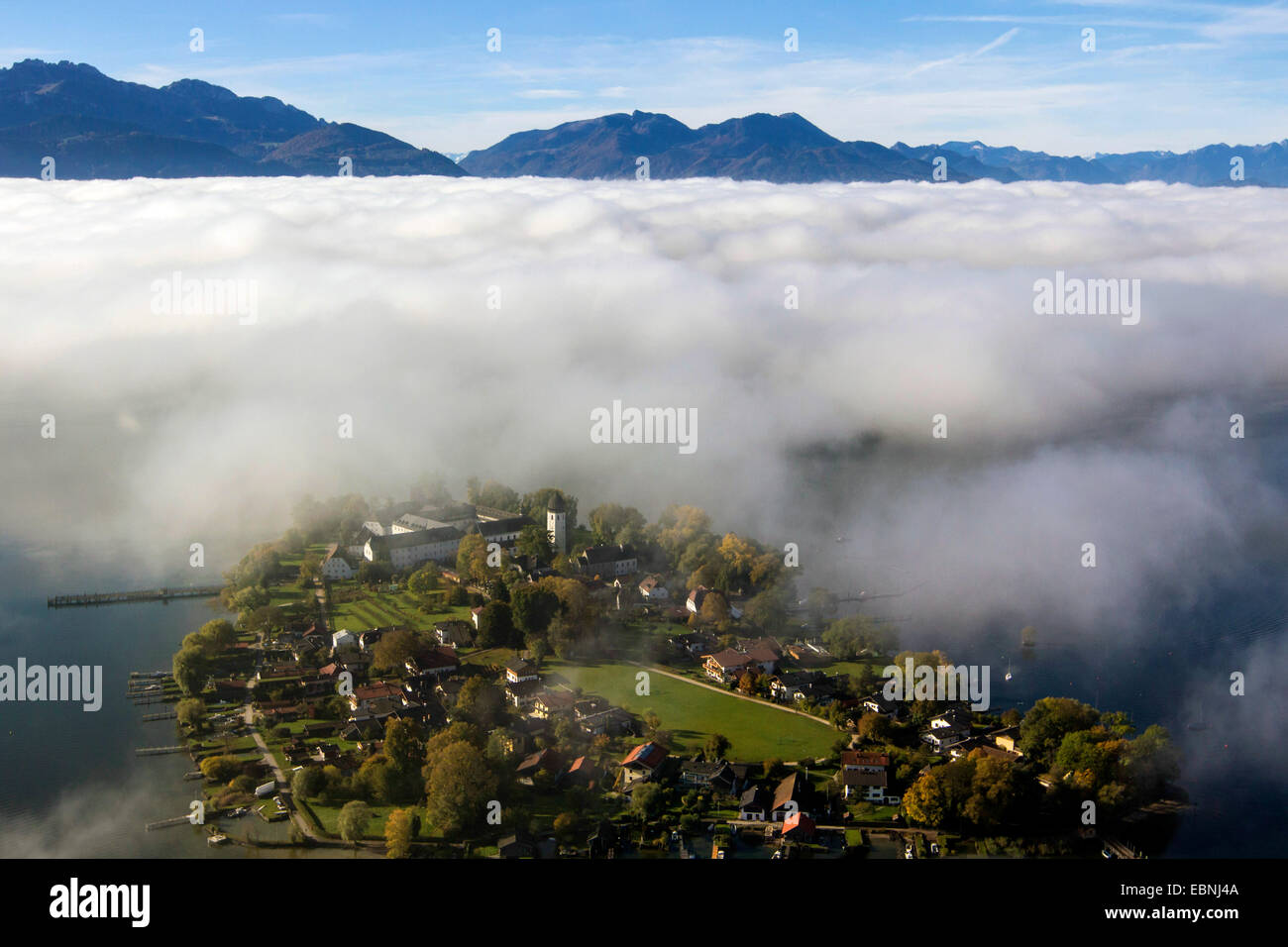 aerial view to Fraueninsel in front of high fog, Germany, Bavaria, Lake Chiemsee Stock Photo