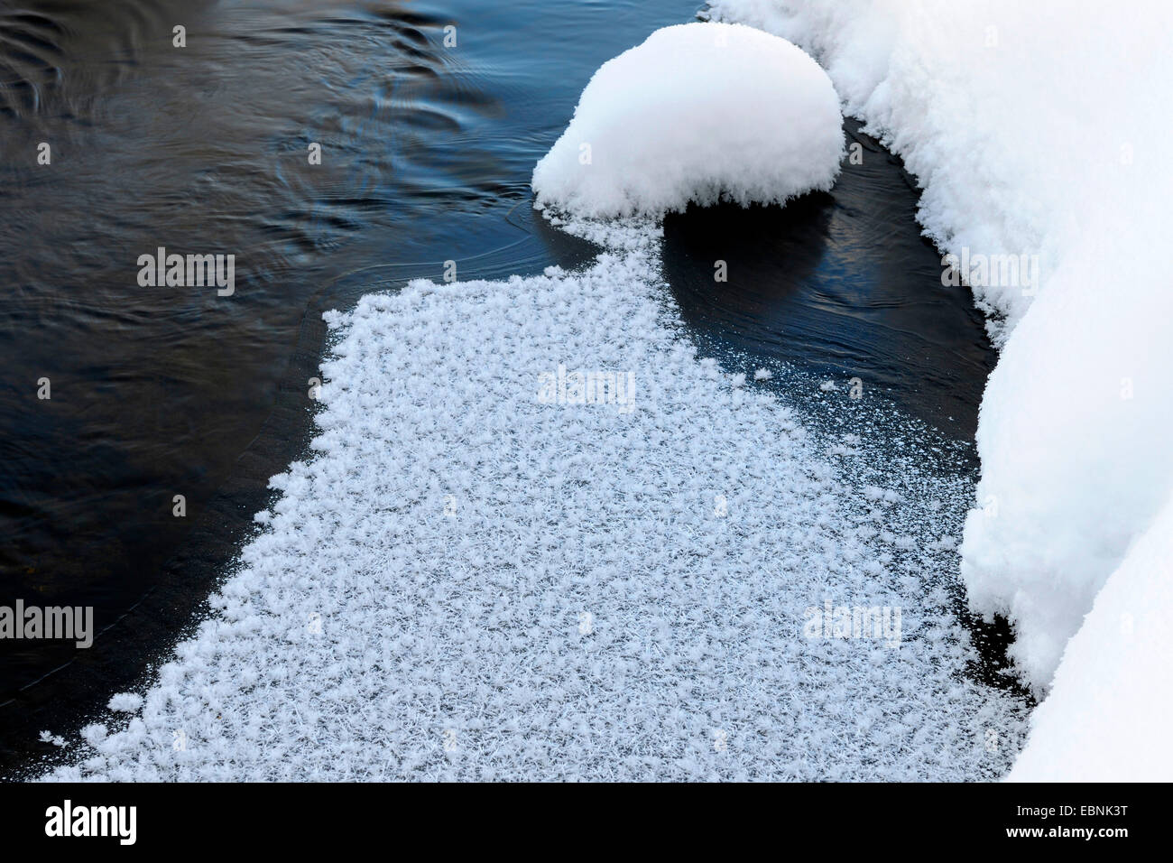 creek beginning to freeze up at -30░, building ice crystals, Finland, Kuusamo Stock Photo