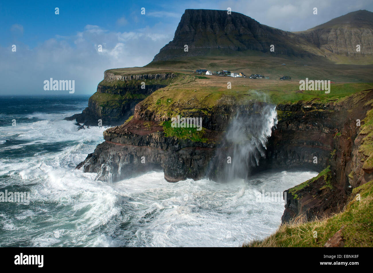 Mulafossur waterfall in a windy day, Gasadalur Village, Vagar Islands, Faroe Islands Stock Photo