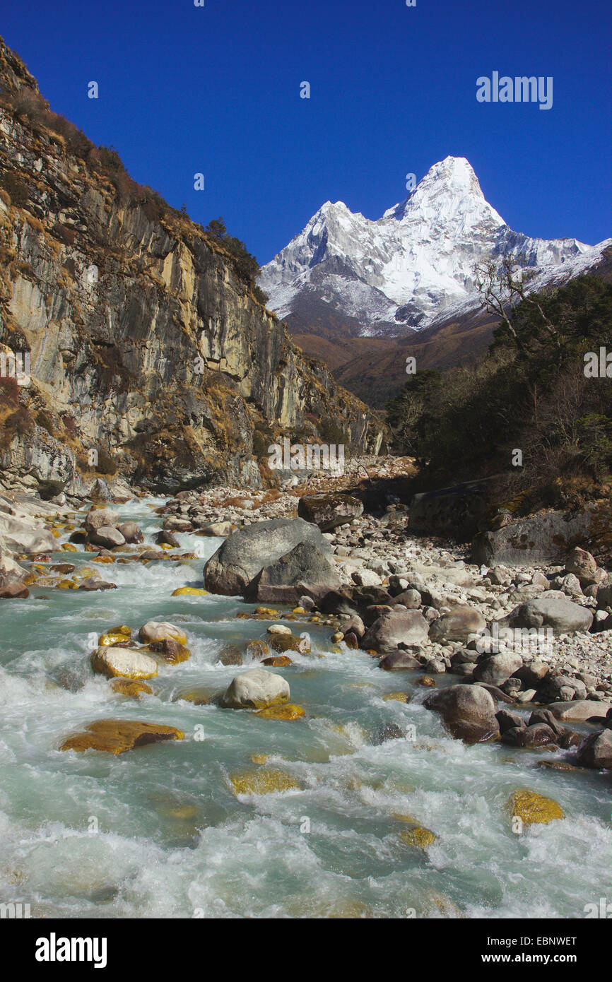view to Ama Dablam and running mountain creek, Nepal, Himalaya, Khumbu Himal, Pangboche Stock Photo