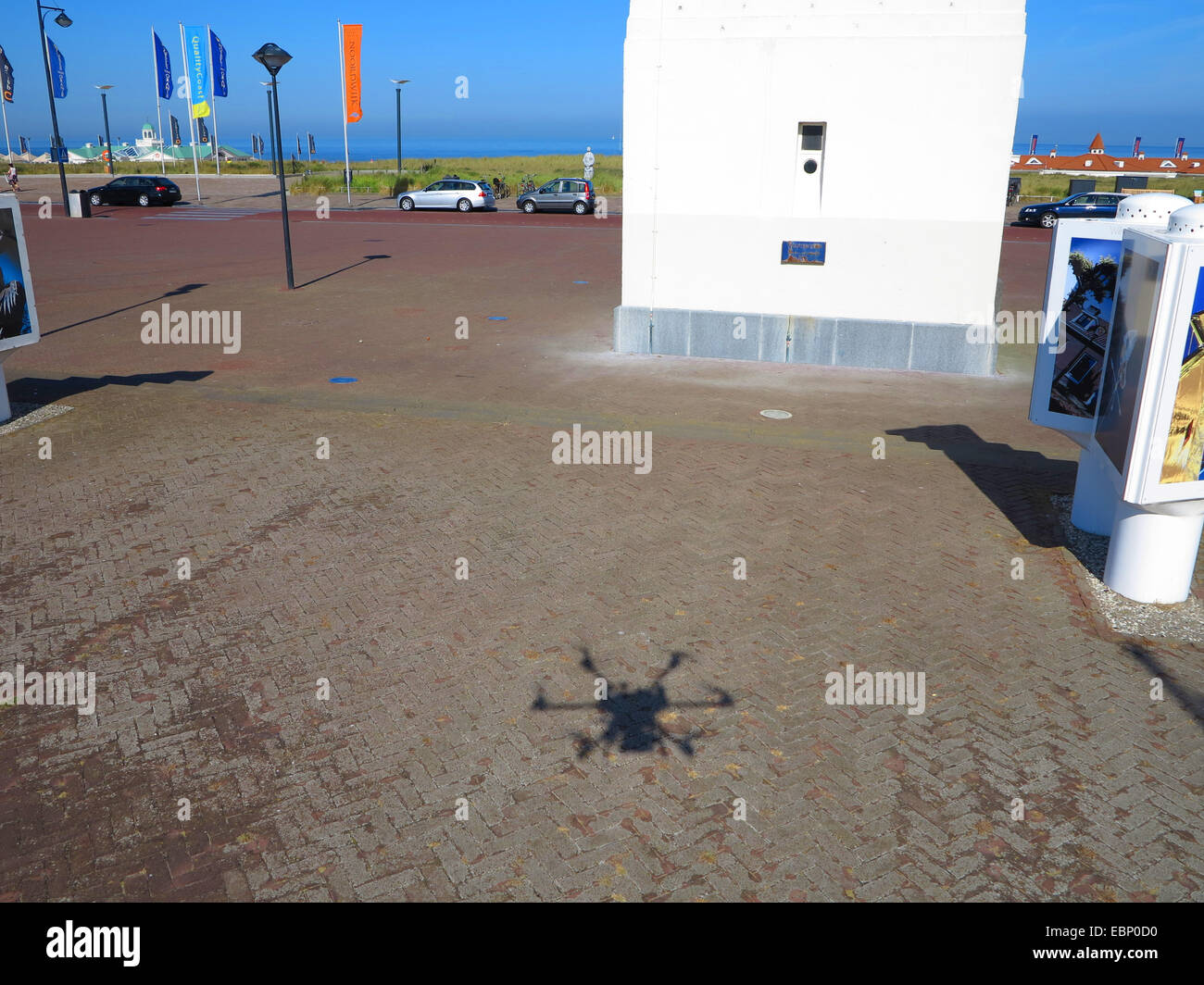 shadow of a civil drone at the lighthouse of Noordwijk, Netherlands ...