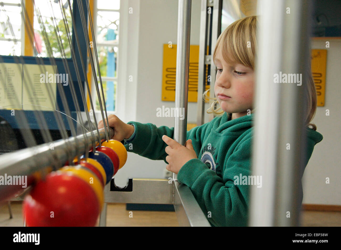 little boy playfully experimenting in the Experimentarium Zingst, Germany Stock Photo