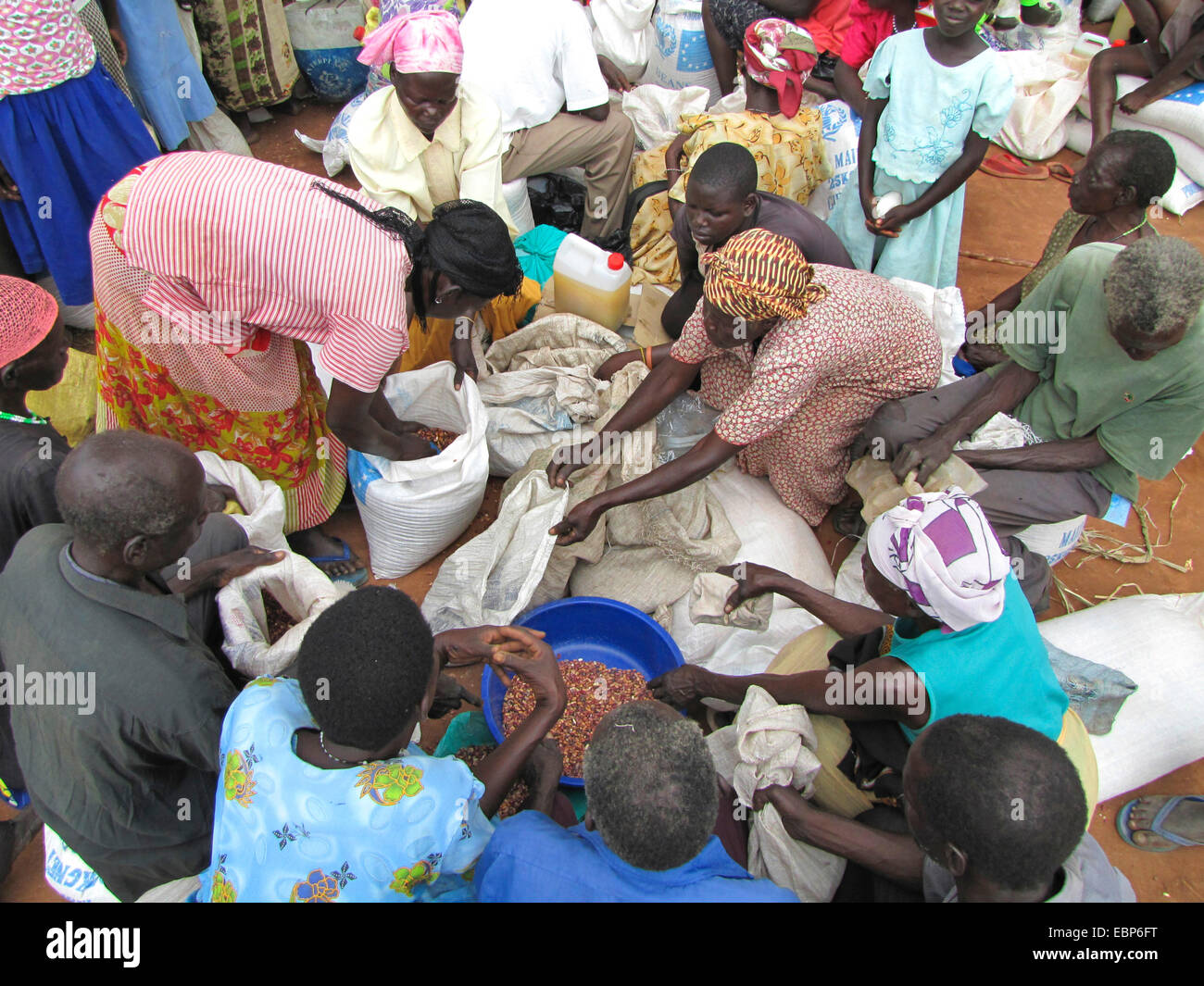 refugee camp for internally displaced people in northern Uganda around Gulu, the non-governmental organisation 'Norwegian Refugee Council' is distributing food rations for the UN World Food Programme for elderly and hancicapped people, bags with mais, Uganda, Gulu, Gulu Stock Photo