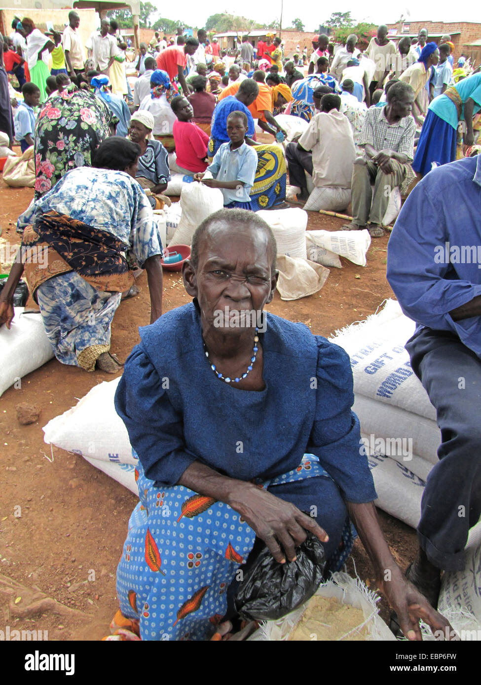 refugee camp for internally displaced people in northern Uganda around Gulu, the non-governmental organisation 'Norwegian Refugee Council' is distributing food rations for the UN World Food Programme for elderly and hancicapped people, bags with mais lyin, Uganda, Gulu, Gulu Stock Photo