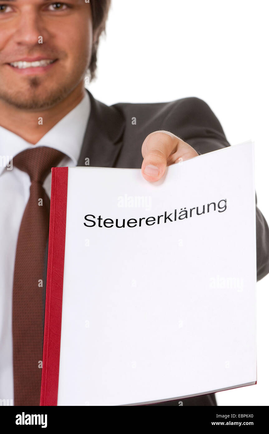 businessman handing over tax declaration, Germany Stock Photo