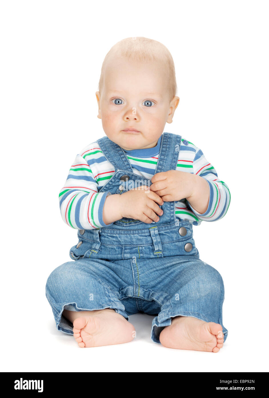 Small cute baby boy in jeans. Isolated on white background Stock Photo