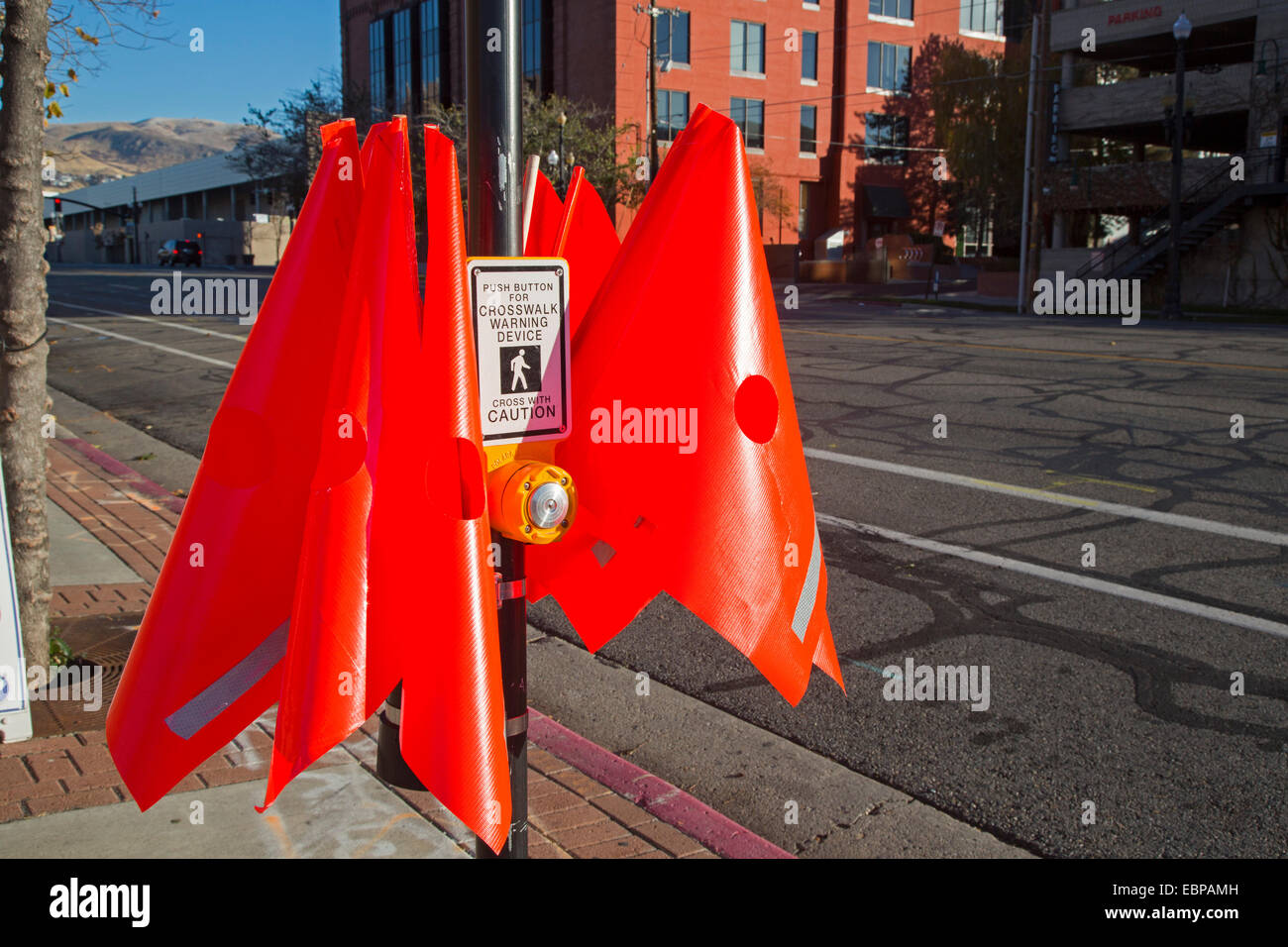 Salt Lake City, Utah - Crosswalk safety flags at a pedestrian street crossing. Stock Photo