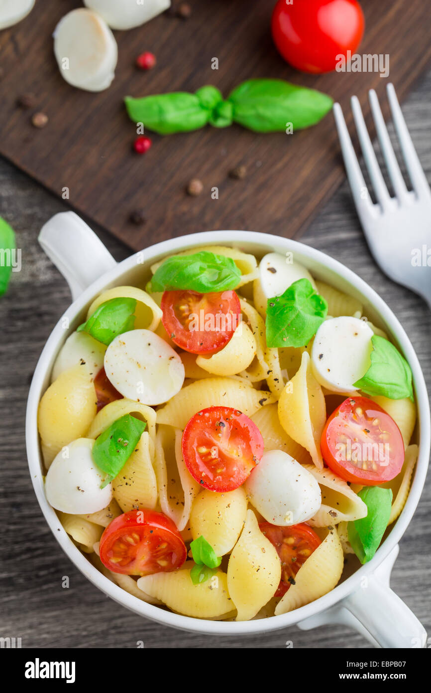 Pasta with mozzarella and tomato Stock Photo - Alamy