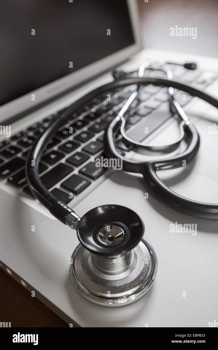 Medical Stethoscope Resting on Laptop Computer Keyboard Stock Photo - Alamy