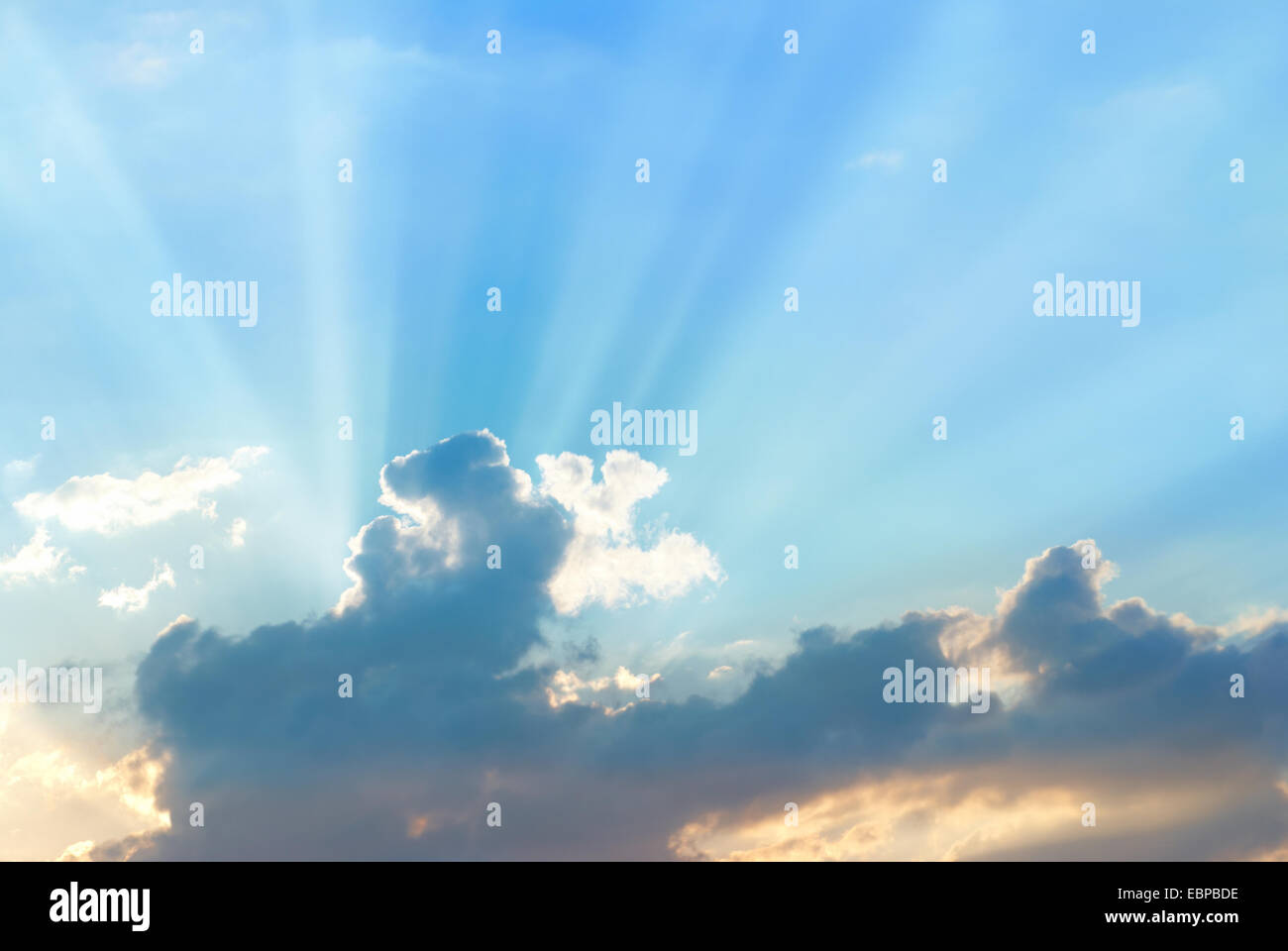 Beautiful blue sky with sunbeams and clouds Stock Photo - Alamy