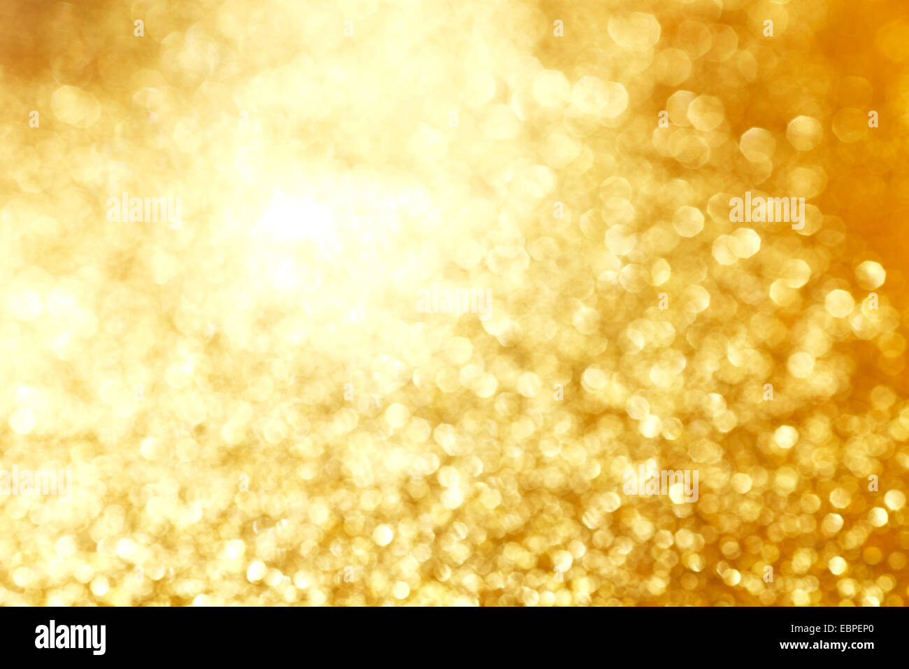 Golden festive glitter background with defocused lights Stock Photo - Alamy