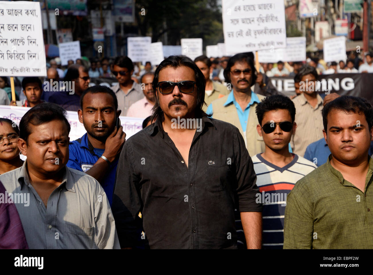 Kaushik Chakroborty with his fellow activist during the BJP minded artists, intellectuals and positive thinker rally from College Square to Dharmatala protesting against the recent SARADHA SCAM. © Saikat Paul/Pacific Press/Alamy Live News Stock Photo