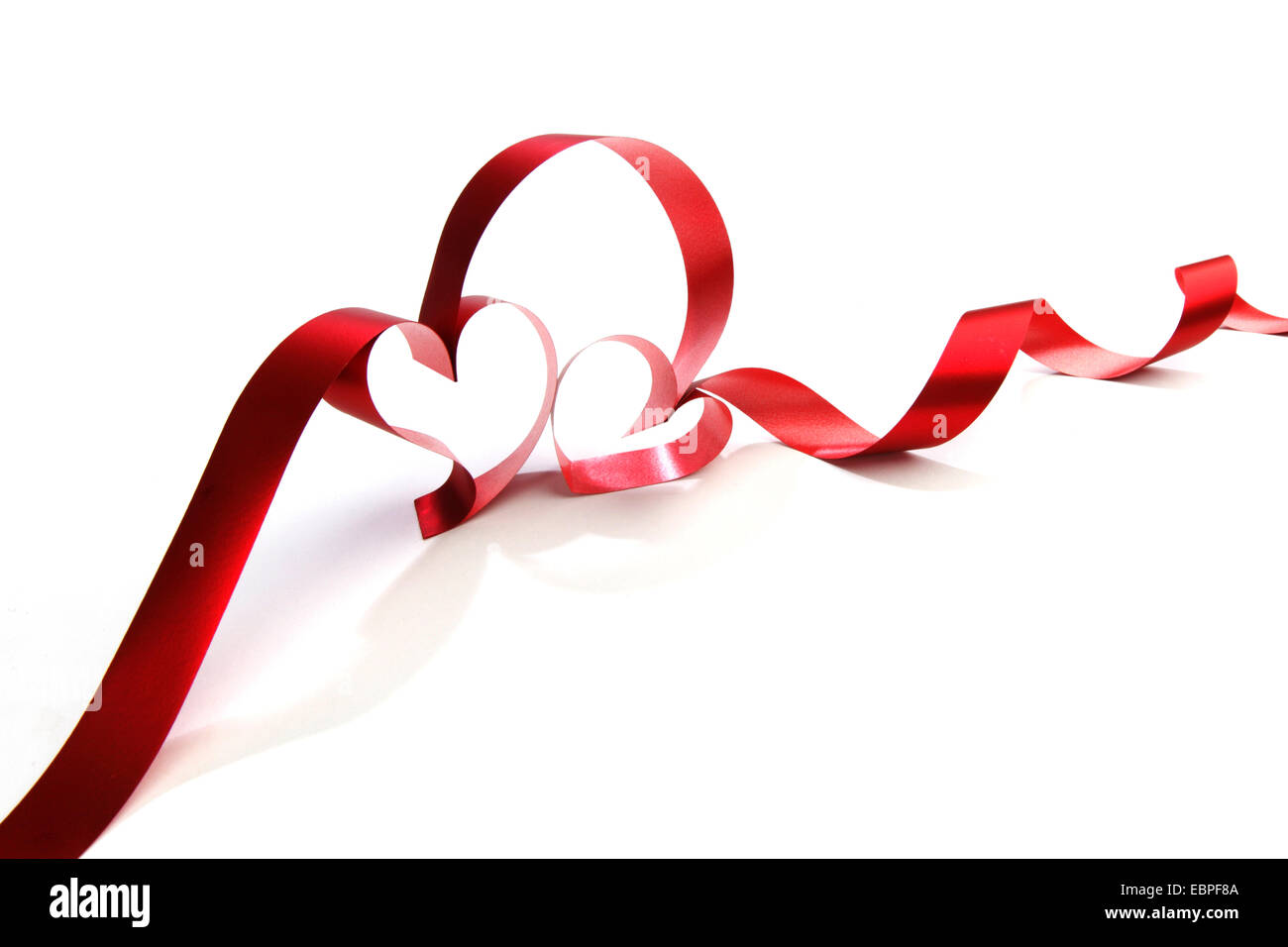 Heart shaped red ribbon isolated on white background Stock Photo - Alamy