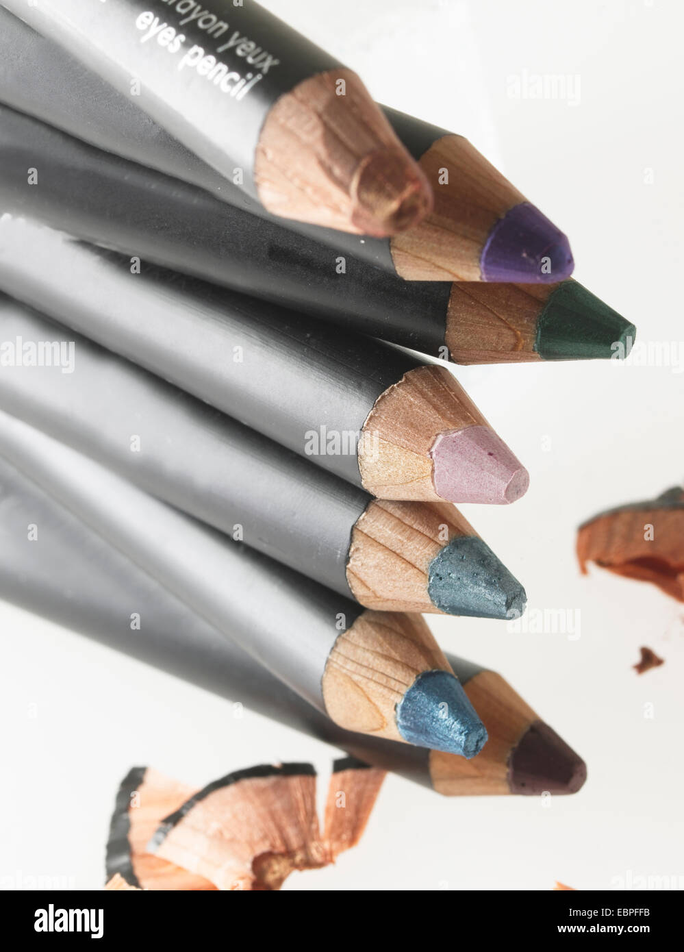 multi color womens eye liner makeup green purple pink pencils Stock Photo