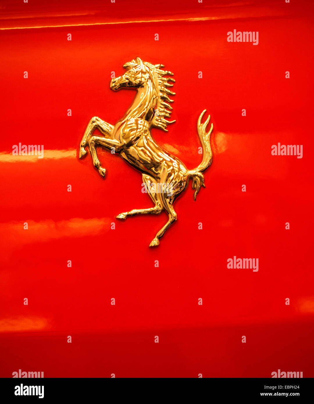 Ferrari Insignia on Red Car Stock Photo