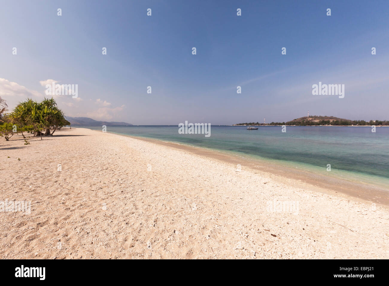 Gili Meno beaches looking towards Gili Trawangan, Indonesia Stock Photo