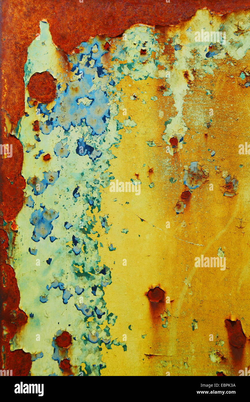 Old paint flaking off a tractor in Western Australia. Stock Photo