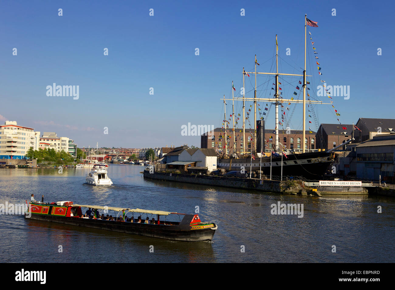 Boats passing the SS Great Britain in Bristol Floating Harbour, Bristol, England, United Kingdom, Europe Stock Photo