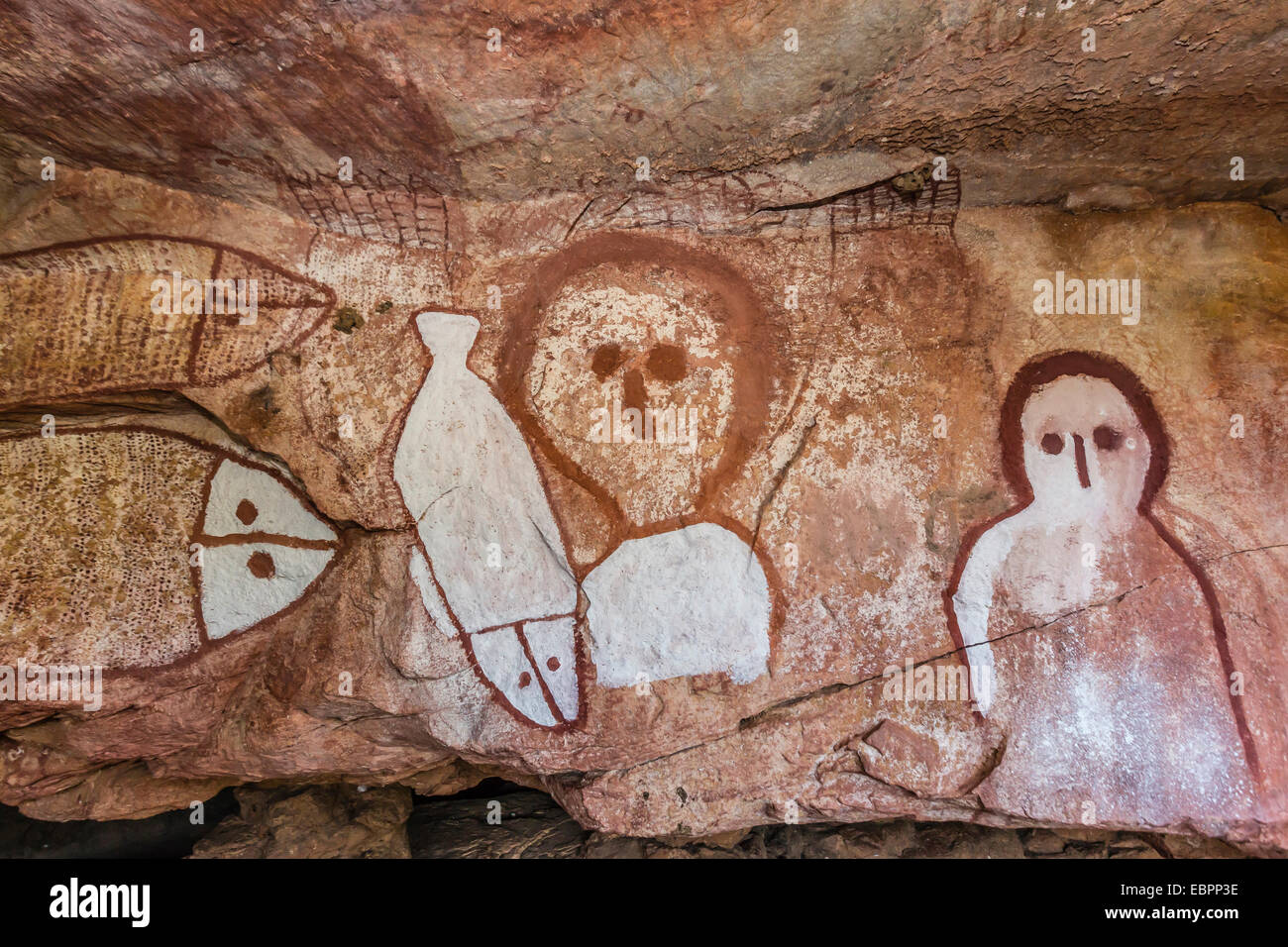 Aboriginal Wandjina cave artwork in sandstone caves at Raft Point, Kimberley, Western Australia, Australia, Pacific Stock Photo