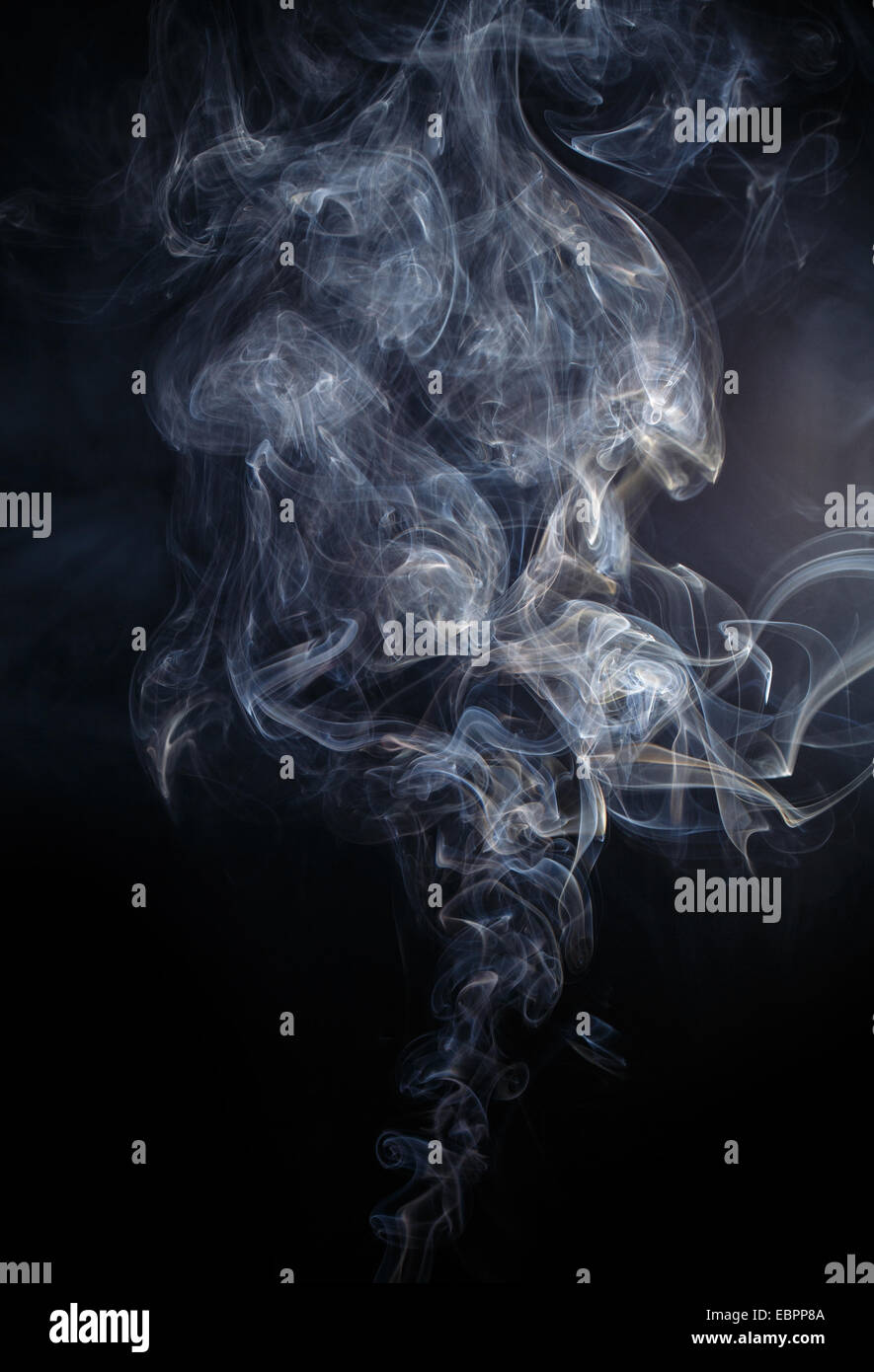Abstract smoke moves on a black background Stock Photo - Alamy