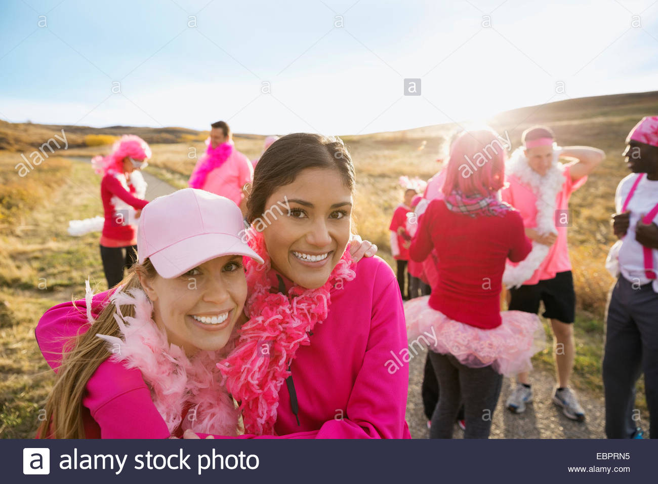 Portrait of women in pink at charity race Stock Photo