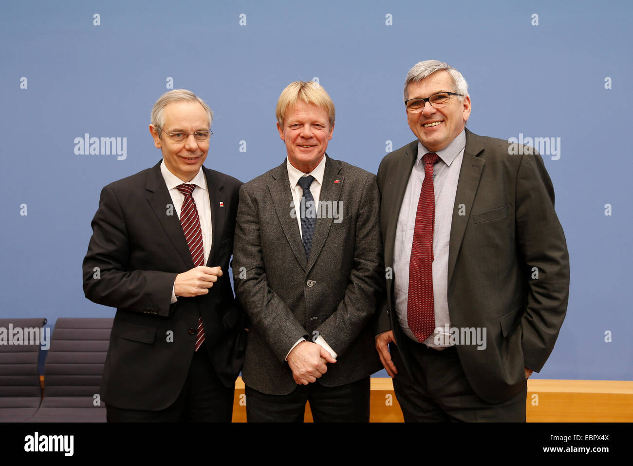 Berlin, Germany. 4th December, 2014. BPK on the topic 'DGB index property work of 2014 - Results of a recent survey of employees on working conditions in Germany with a focus on working time organization' at house of the federal press conference in Berlin, on 4 December 2014 in Berlin, Germany. / Picture: Michael Vassiliadis, IG BCE Chairman, and Joerg Hofmann, vice chairman of IG Metal, and Reiner Hoffmann, DGB Chairman. Credit:  Reynaldo Chaib Paganelli/Alamy Live News Stock Photo