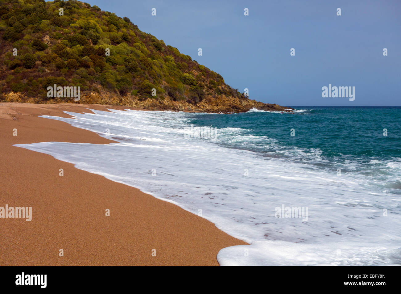 Golden beach and breaking waves, southern Corsica, France Stock Photo