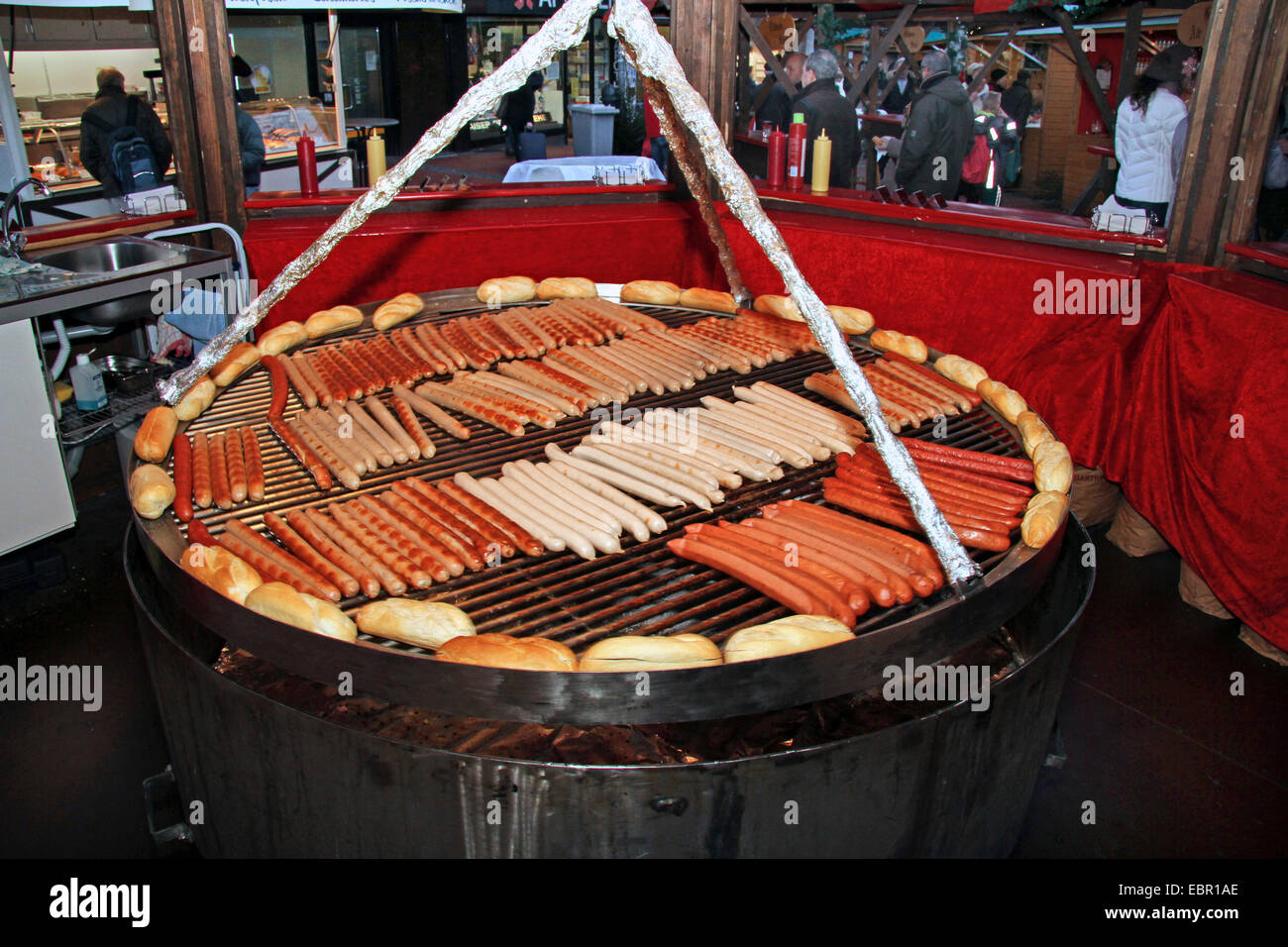 barbecue sausages on swivel grill, Germany Stock Photo - Alamy