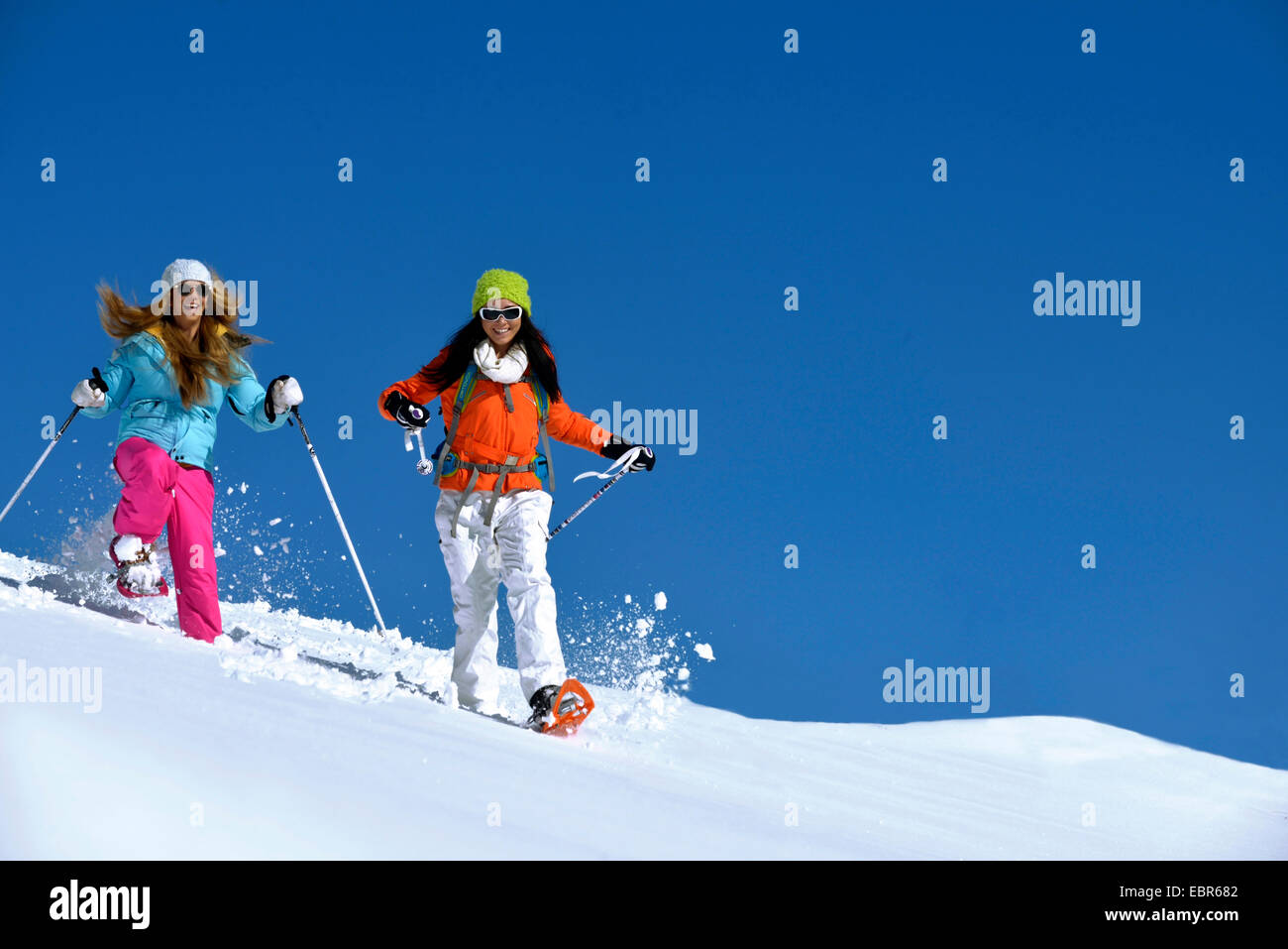 two teens snowshoeing, France Stock Photo