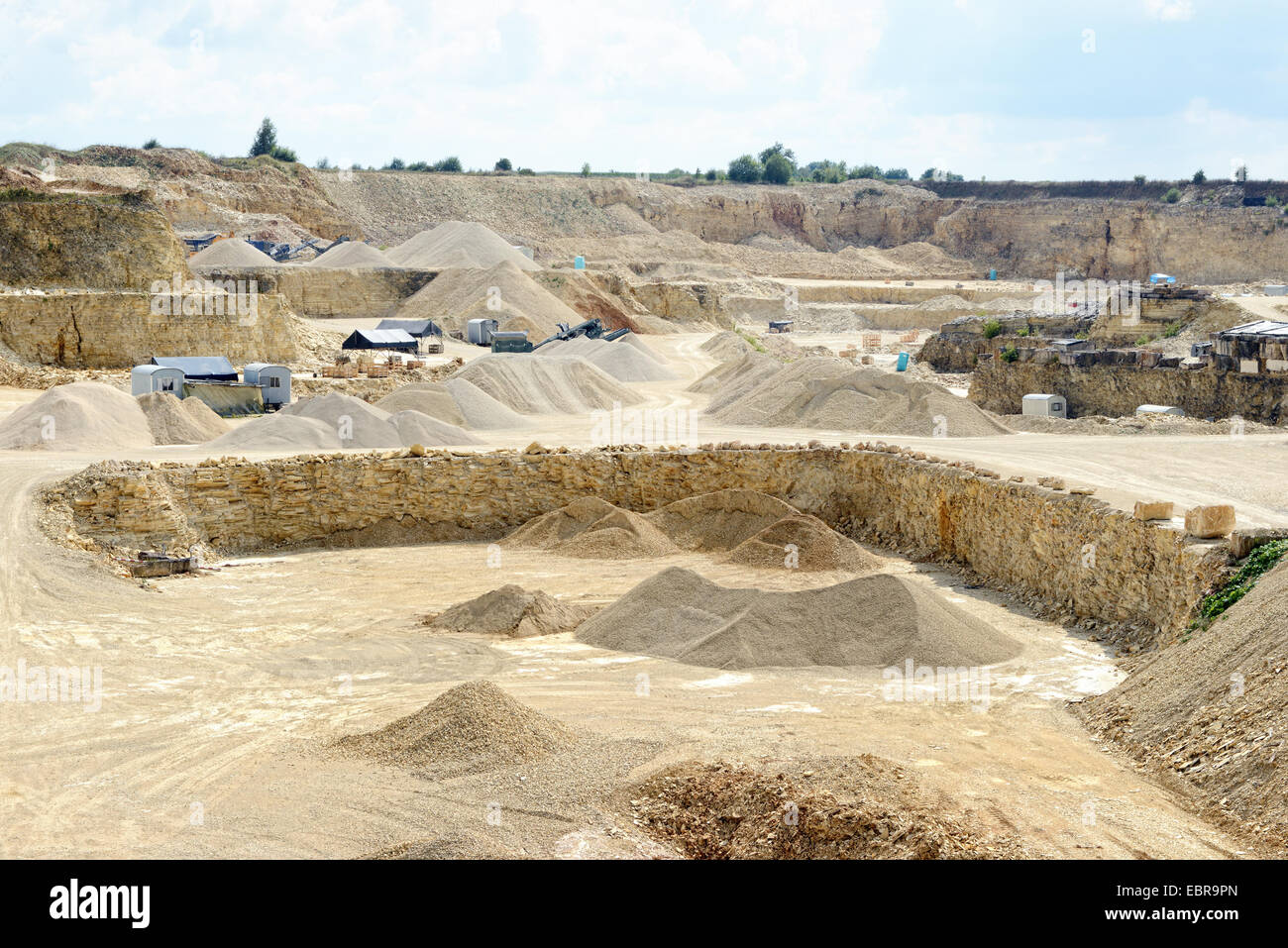 sedimentary rocks at a limestone quarry. open pit mine. mining industry