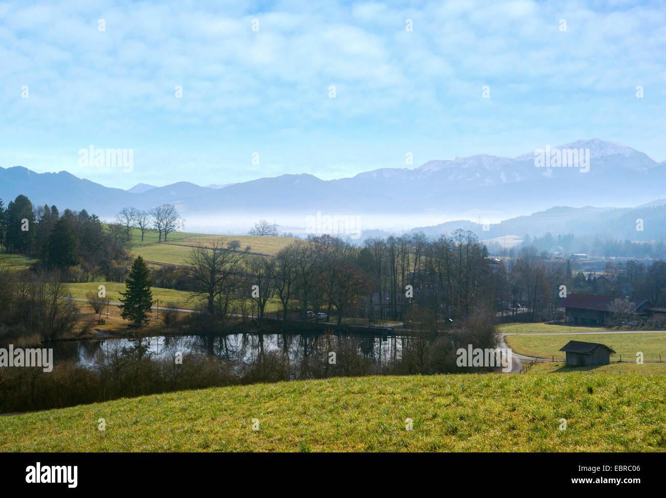view to small lake and Karwendel Mountains in morning mist, Germany, Bavaria, Oberbayern, Upper Bavaria, Habach bei Murnau Stock Photo