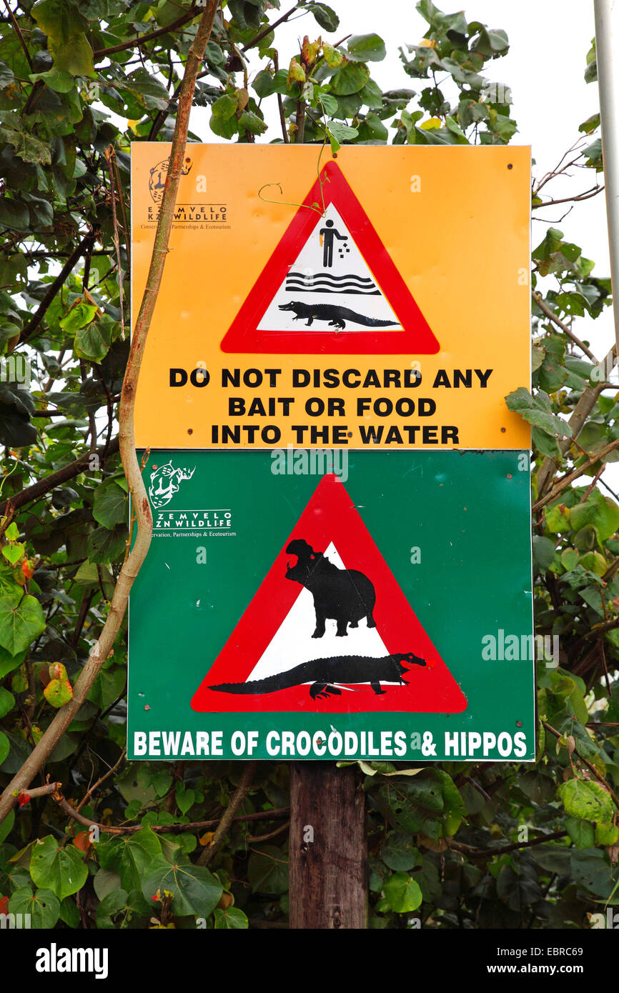 Nile crocodile (Crocodylus niloticus), warning label to crocodiles, South Africa, St. Lucia Wetland Park Stock Photo