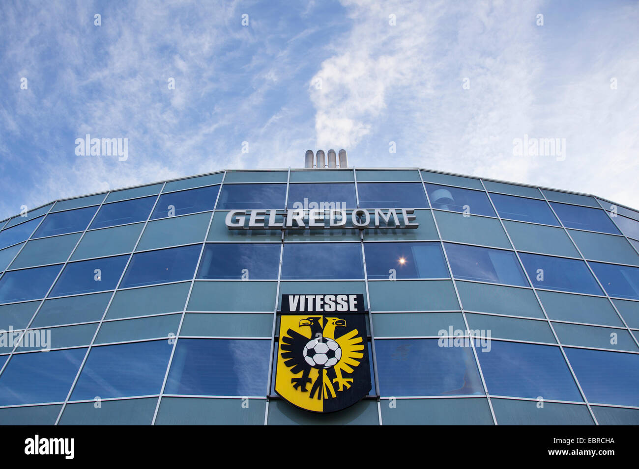 facade of soccer stadium gelredome in the dutch town of arnhem with vitesse logo Stock Photo
