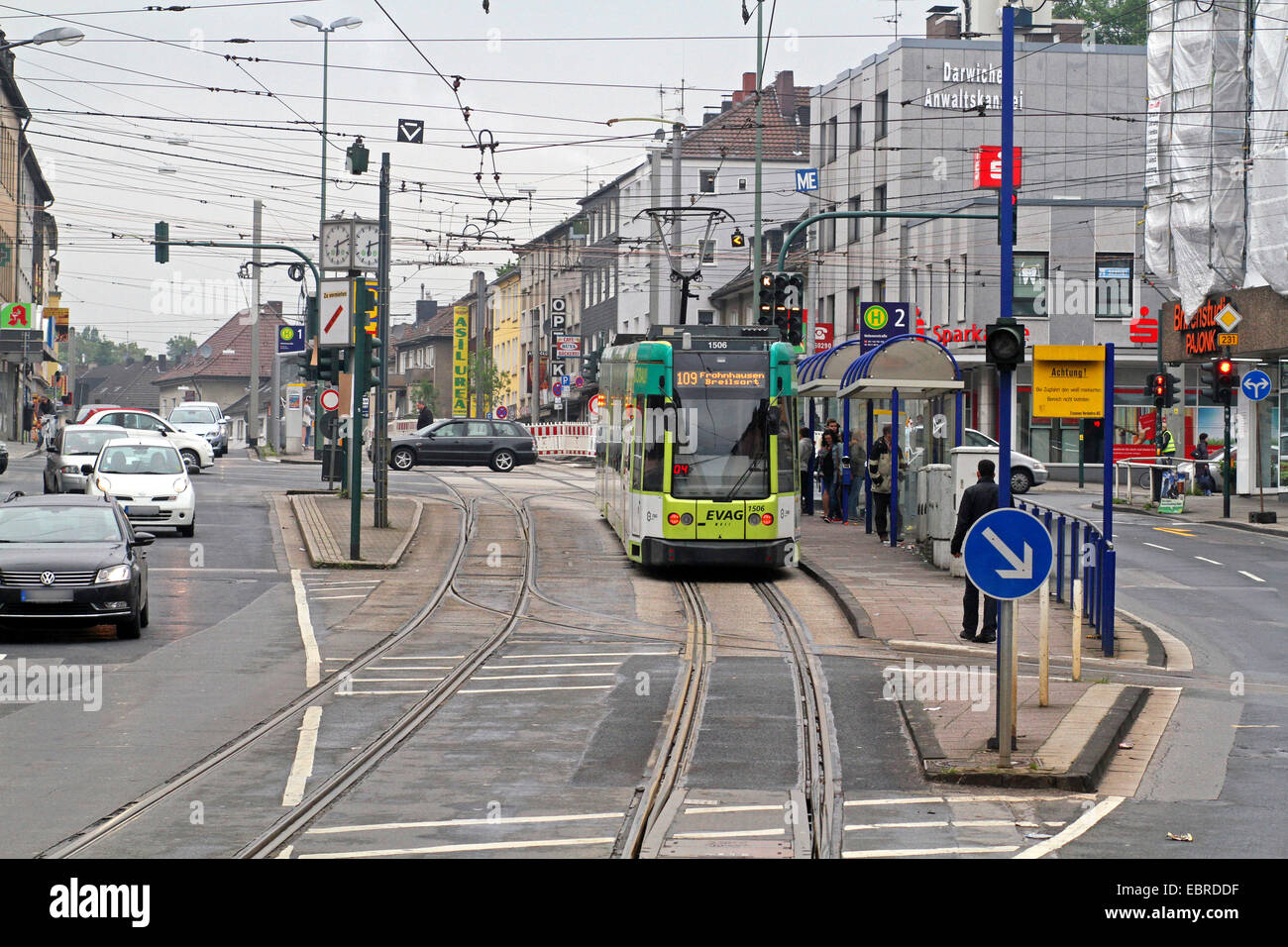 street with tram and tram station, Germany Stock Photo
